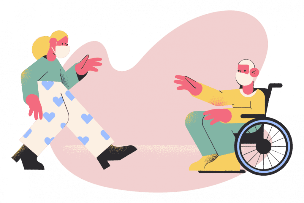 two people wearing masks. One in a wheelchair.