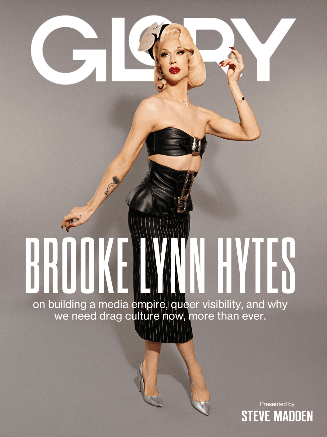 GLORY Magazine cover image with drag queen Brooke Lynn Hytes standing in a leather top and skirt with silver high heels and her name emblazoned over top.