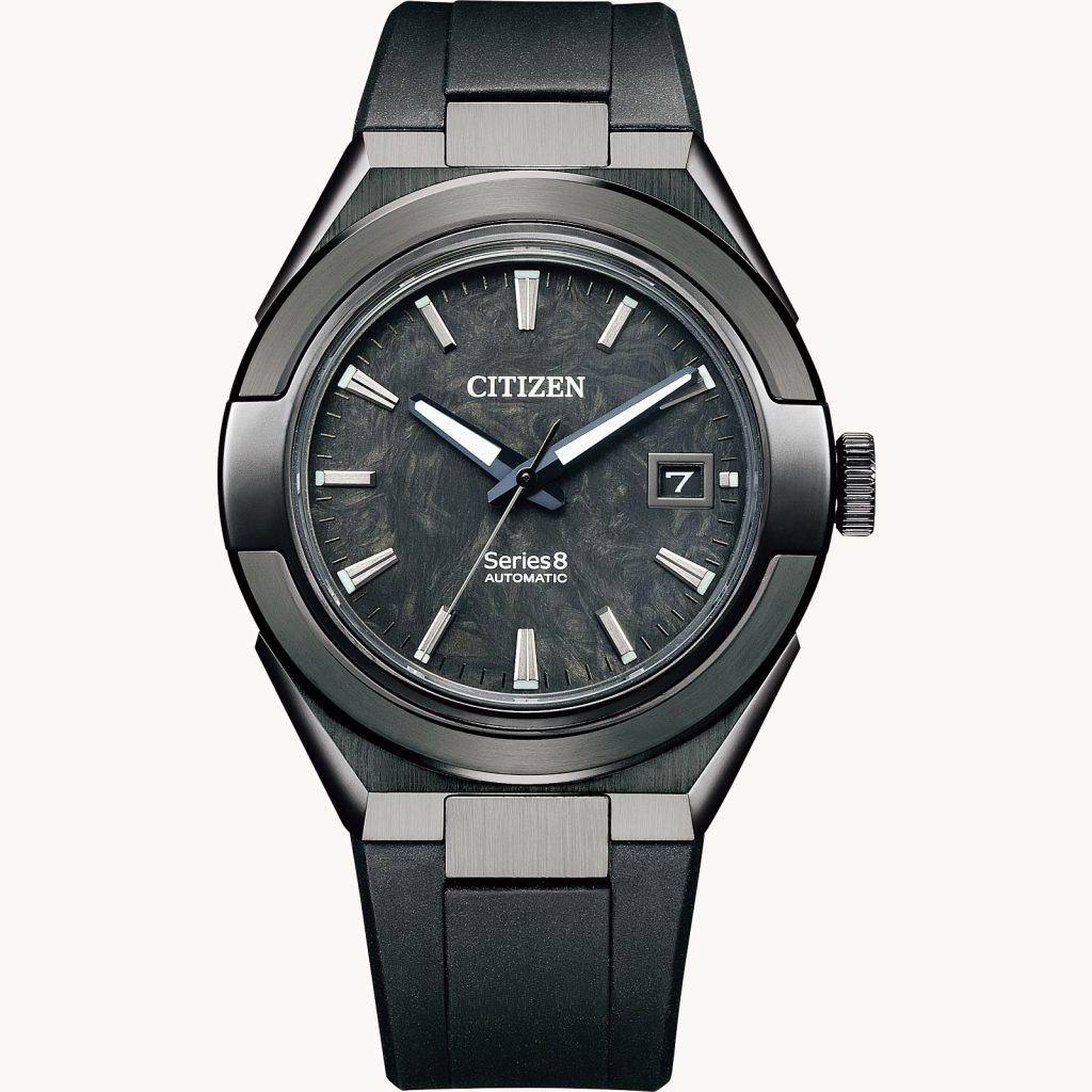 This photo shows the front face of the Citizen Series 8 watch. It's a nice sleek gray and it says "Citizen Series 8 Automatic" on it