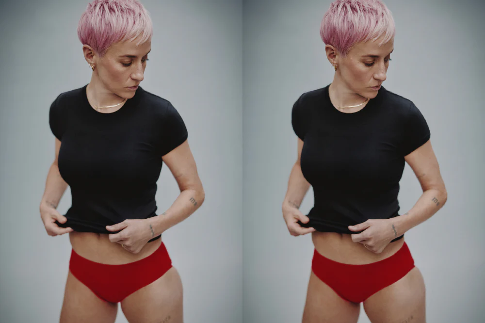 Megan Rapinoe in a black t-shirt and red underwear