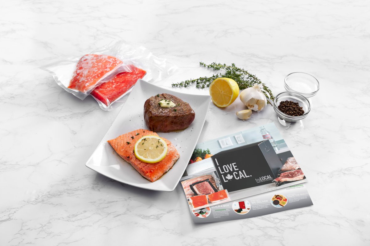 Picture of fish and meat products in vacuum-sealed bags with a truLOCAL pamphlet.