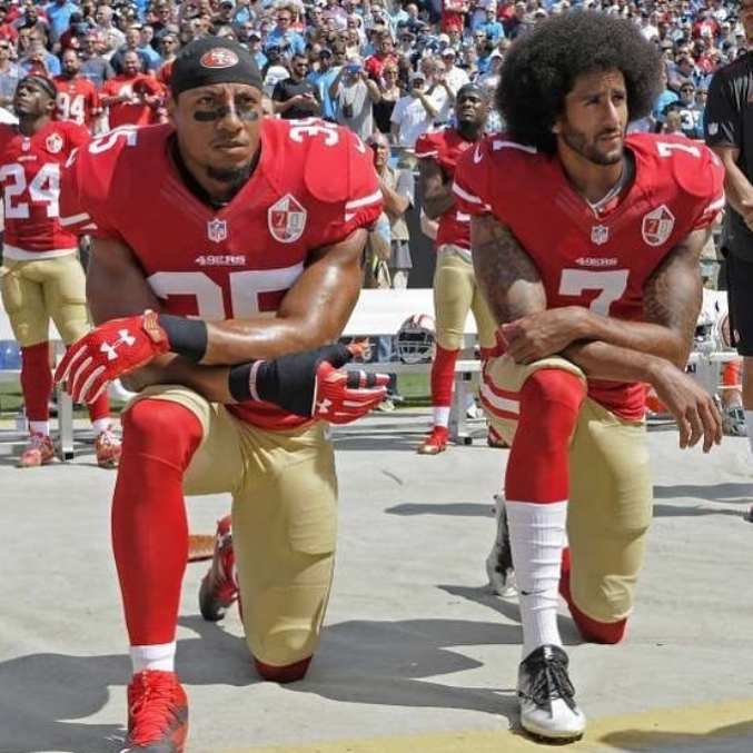 Eric Reid and Colin Kaepernick kneeling