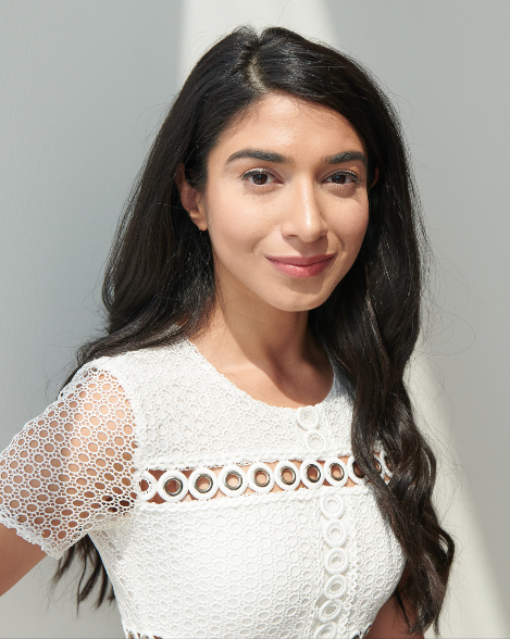 Our Place Founder Shiza Shahid in white dress
