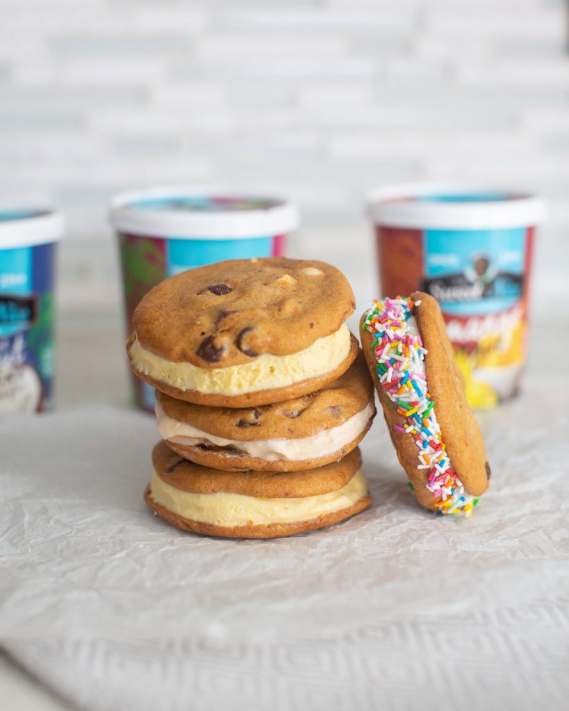 Ice ccream sandwiches made with chocolate chip cookies and Neale's Sweet N' Nice Ice Cream